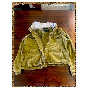 Olive green jacket with grey hood.